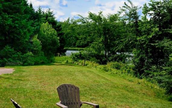 Exterior fire pit with firewood included with cottage to rent front off river Domaine McCormick Pignon Sud