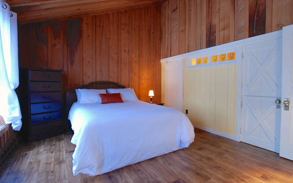 Chambre des maîtres chalet en location Mauricie