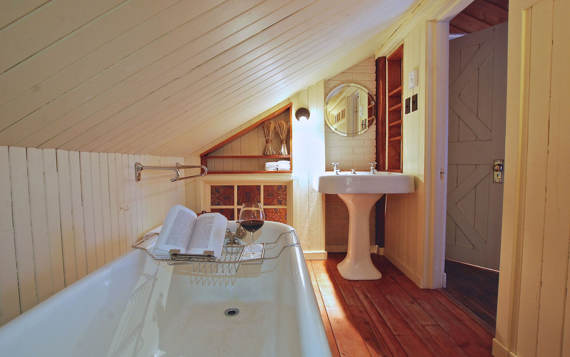 Salle de bain chambre principale chalet à louer avec bain sur pattes