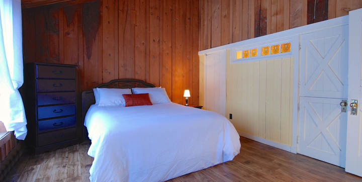 Chambre des maîtres chalet en location Mauricie